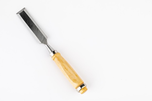 Chisel for carpentry, isolated on a white background.