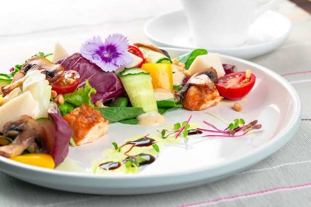 Chisken breast and mushroom salad with vegetables