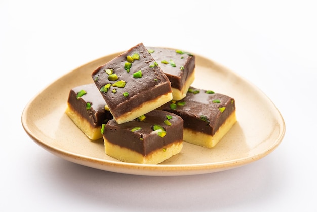 Choco Vanilla Pateesa or chocolate mawa barfi or or two layered burfi Indian sweet or dessert