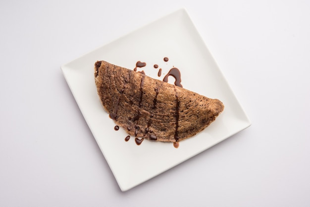 Chocolade dosaÃ‚Â is een speciaal Indiaas recept voor kinderen, dat kan worden geserveerd als ontbijt of als tussendoortje.