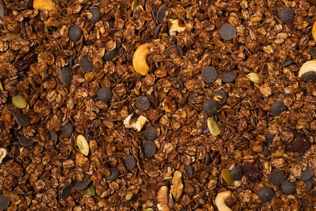 Chocolade muesli granen met noten achtergrond Bovenaanzicht