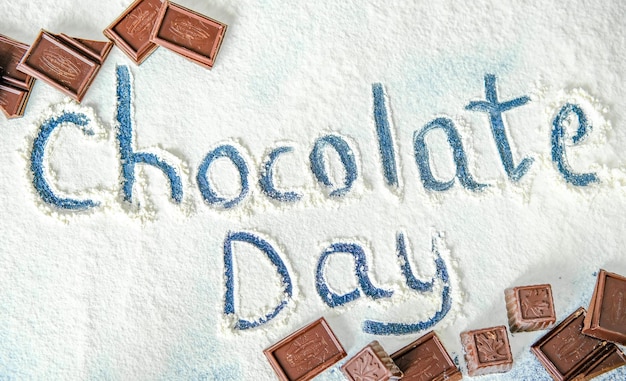 Foto chocoladedag wereld chocoladedag ansichtkaart met chocolaatjes