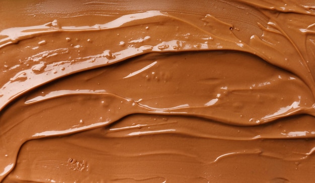 チョコレートの背景 溶けたチョコロート 巻き