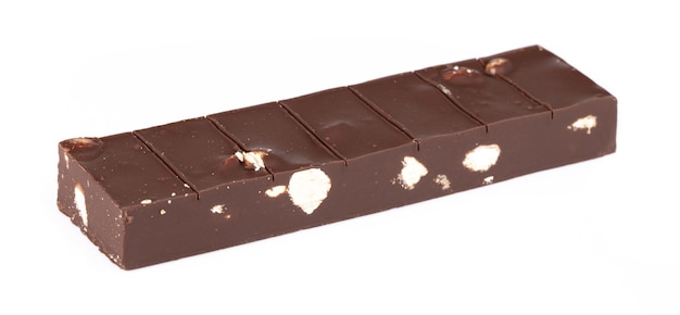 Chocolate bar with nuts almond broken into pieces isolated on a white background