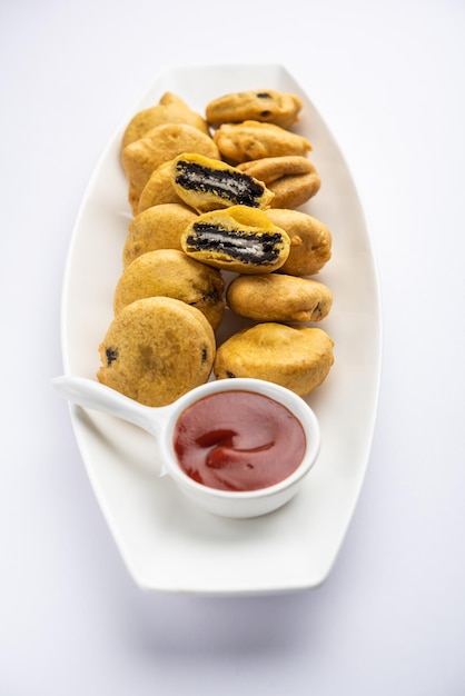 Chocolate biscuit pakora pakodas or fritters creative Indian teatime snack