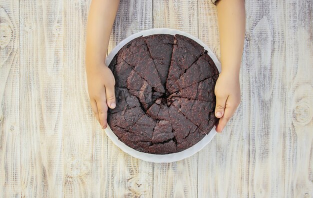 Chocolate brownie, selective focus. food and drink.