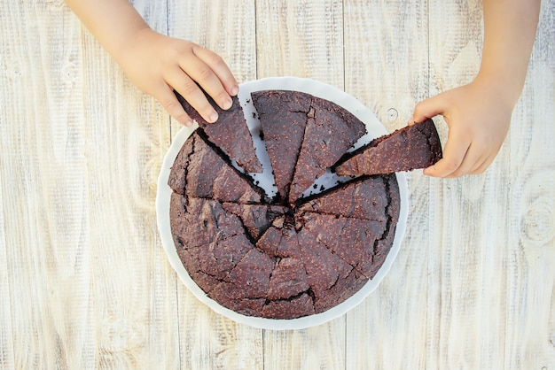 Chocolate brownie, selective focus. food and drink.