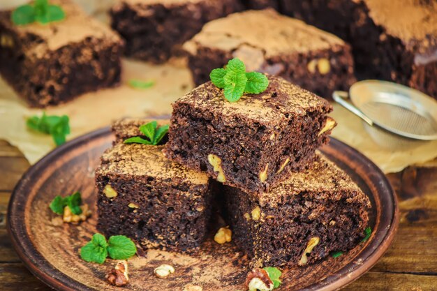 Chocolate brownie, selective focus. food and drink.