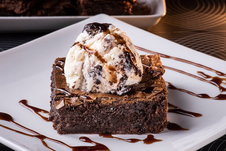 Photo chocolate brownie with ice cream on the plate