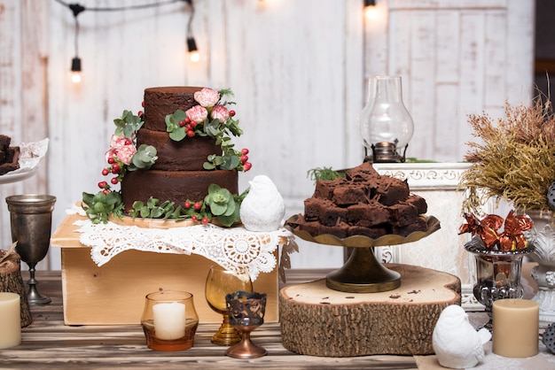 Chocolate brownies in stacked on wooden table