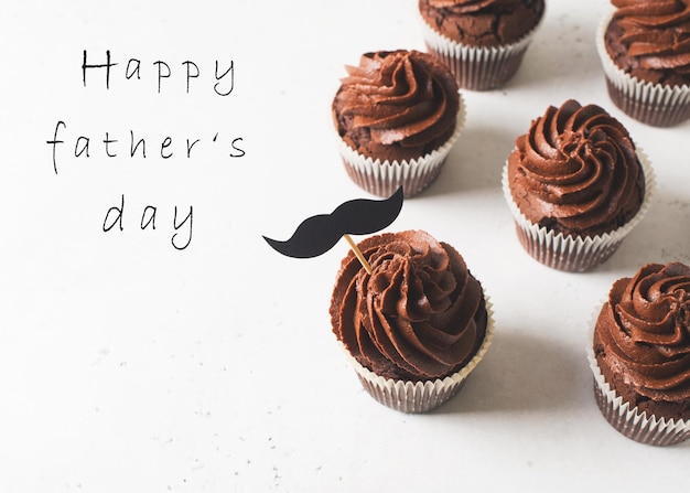 Chocolate cacao cupcakes with moustache fathers day concept