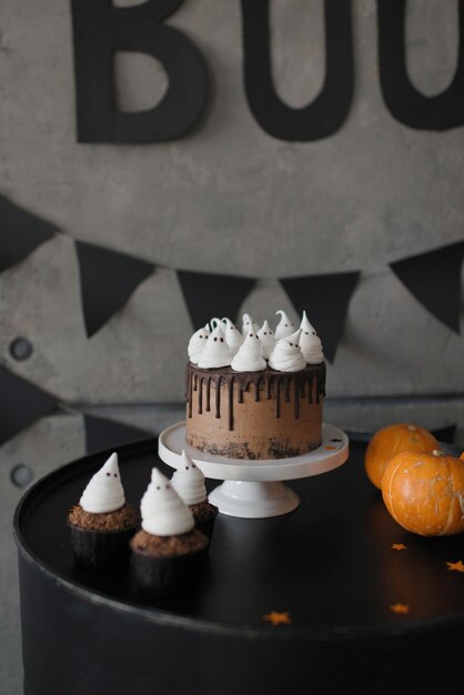 Chocolate cake decorated with little ghosts