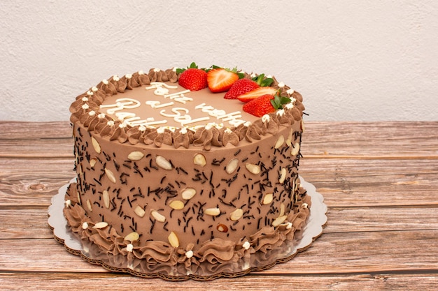 Chocolate cake decorated with strawberries