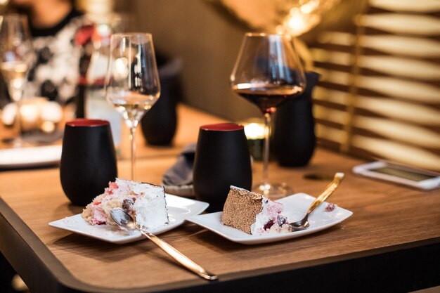 Chocolate cake and glasses of wine