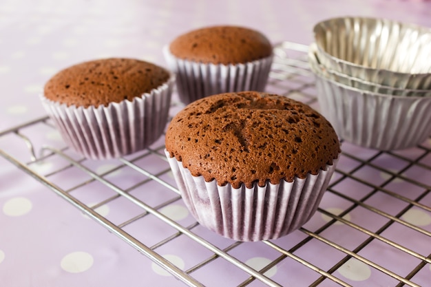 Chocolate cake on sieve.