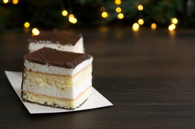 Chocolate cake souffle on a background of bokeh lights.