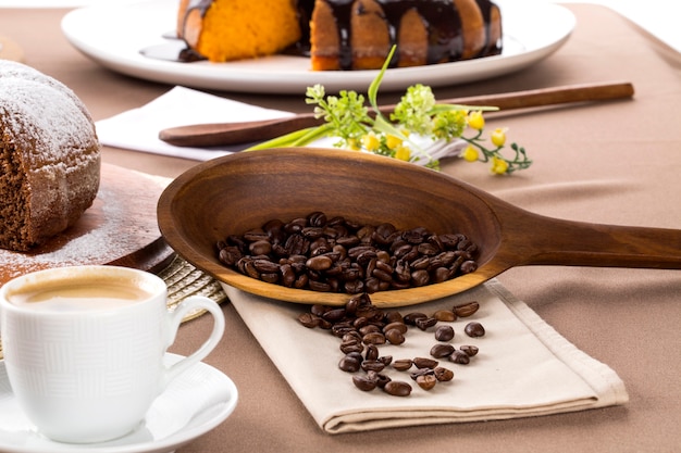 Chocolate cake on the table with cooffe