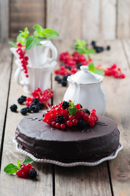 Chocolate cake with berry and mint