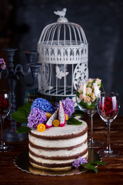 Chocolate cake with butter cream in rustic style