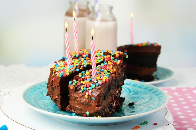 Chocolate cake with chocolate milk on table closeup