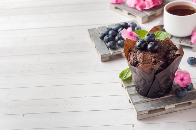 Chocolate cake with mint and blueberries. 