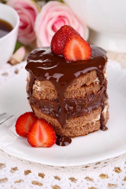 Chocolate cake with strawberry on table closeup