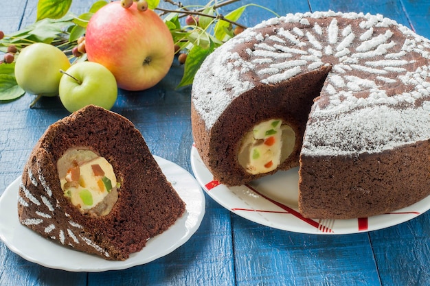 Chocolate cake with whole apples curd and candied fruit