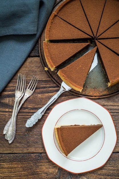 Chocolate cake on wooden table