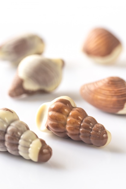 Chocolate candies on the white background