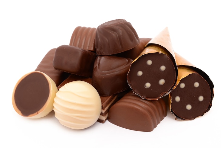 Photo chocolate candies on a white surface