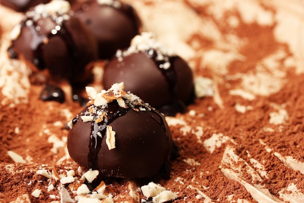 Chocolate candies with nuts close up