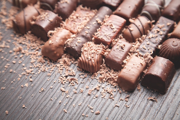 Chocolate candies on wood table