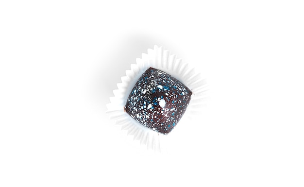 Изолированные шоколадные конфеты. Космическая конфета.