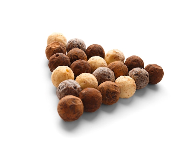 Chocolate candy truffles on white background