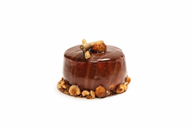 Chocolate and caramel cake isolated on a white surface