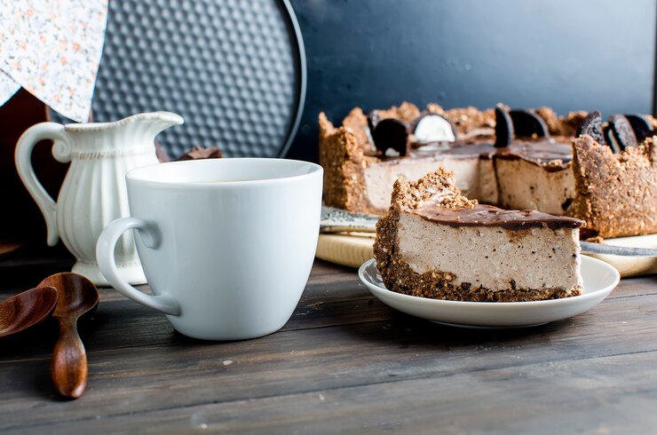 Photo chocolate cheesecake and cup of coffee