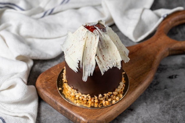 Chocolate and chestnut cake Delicious cake on dark background