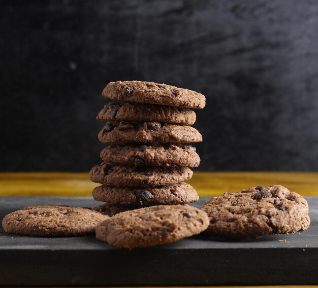 Chocolate chip cookies on black background