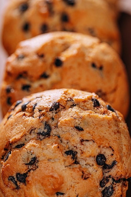 Chocolate chip cookies closeup on brown background