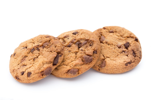 Chocolate chip cookies isolated on white surface.