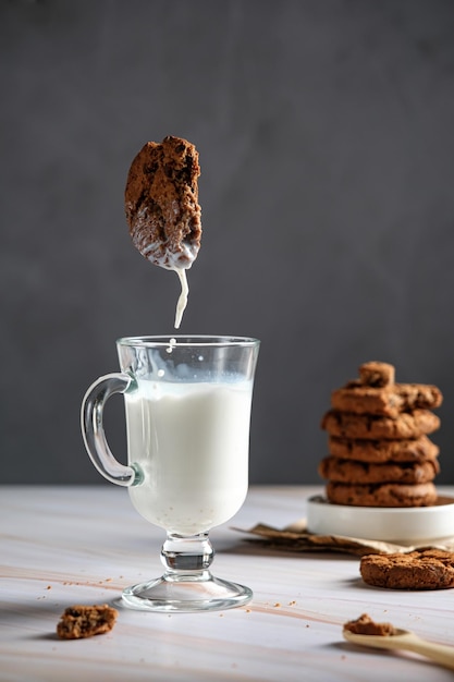 chocolate chip cookies and milk, motion freeze, food levitation,oatmeal cookies with crumbs and milk