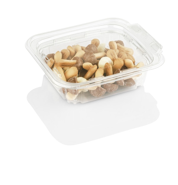 Photo chocolate chip cookies shaped like mushrooms in a transparent box isolated