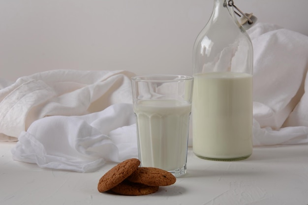 Chocolate chip cookies  with milk on white background