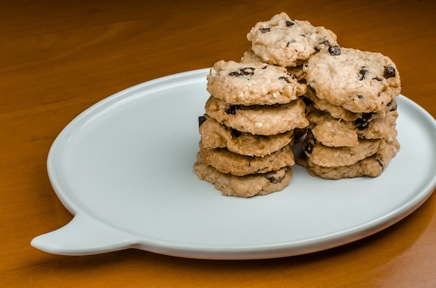 Chocolate chip cookies on wood table 