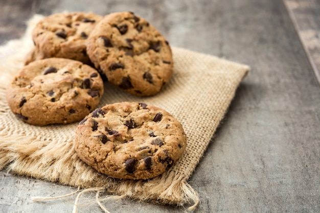 Chocolate chip cookies on wooden table, Copy space