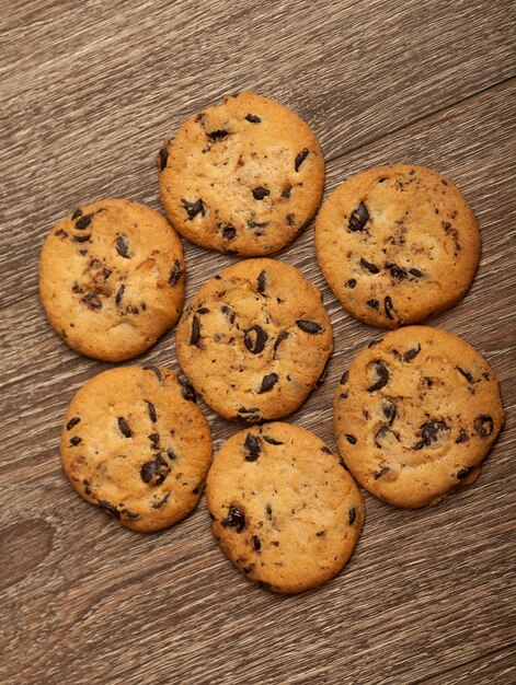 Chocolate chip cookies on wooden table