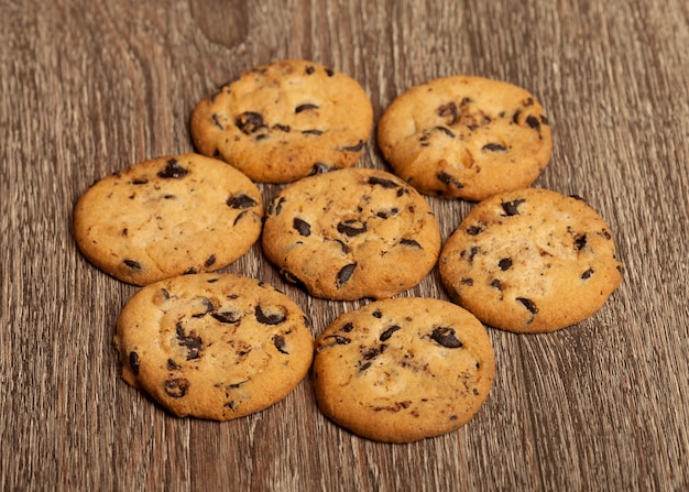 Chocolate chip cookies on wooden table