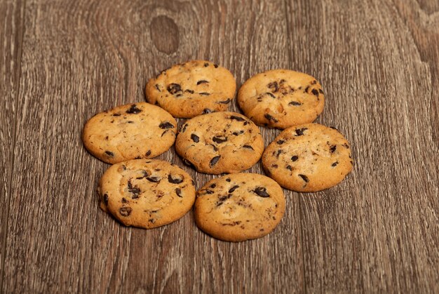 Chocolate chip cookies on wooden table