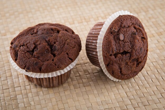 Chocolate chip muffin on wood table