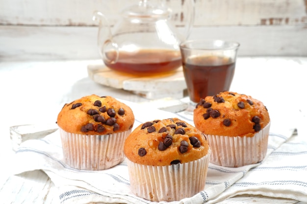 chocolate chipmuffins on white background